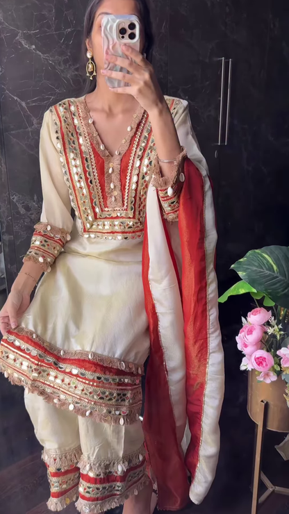 Traditional Ivory Punjabi Suit with Red Mirror Work and Shell Accents