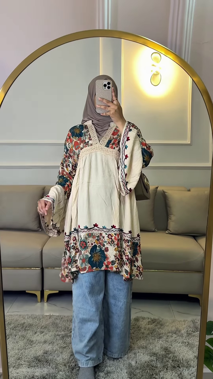 Bohemian Floral Print Tunic with Tassel Neckline and Flare Sleeves
