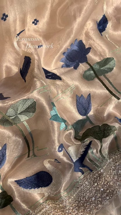 Close-Up of Exquisite Silk Fabric with Hand-Embroidered Lotus and Swan Motifs